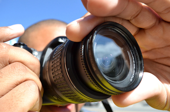 Close up of videographer, Photo credit John Henson